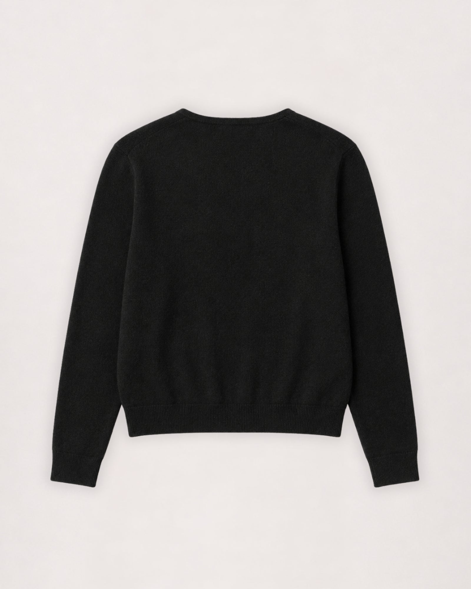 Merino cardigan in black, flat lay back view