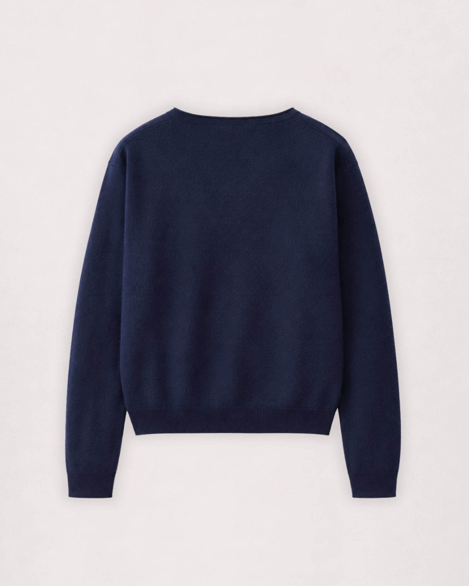 Merino cardigan in navy, flat lay back view