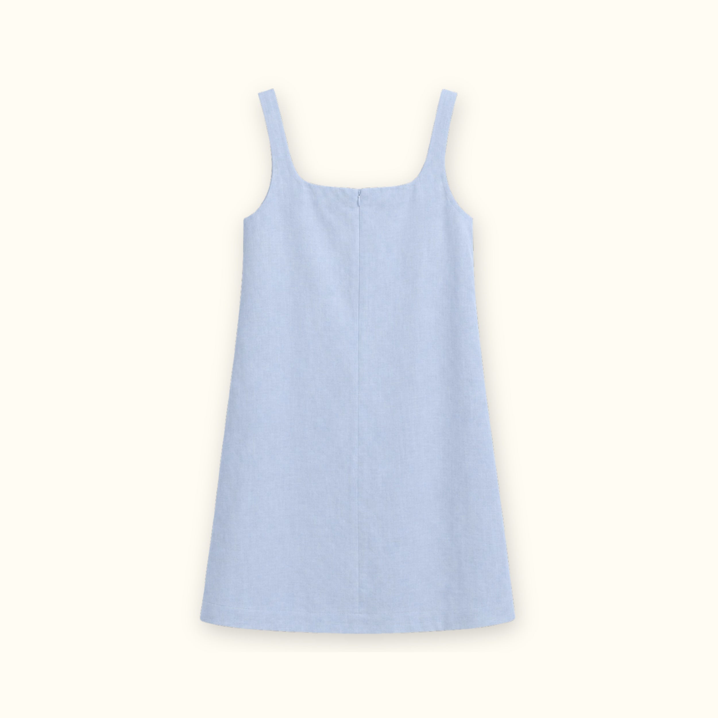 Vestido mini de lino en azul claro, vista trasera, mostrando el escote y la silueta del vestido