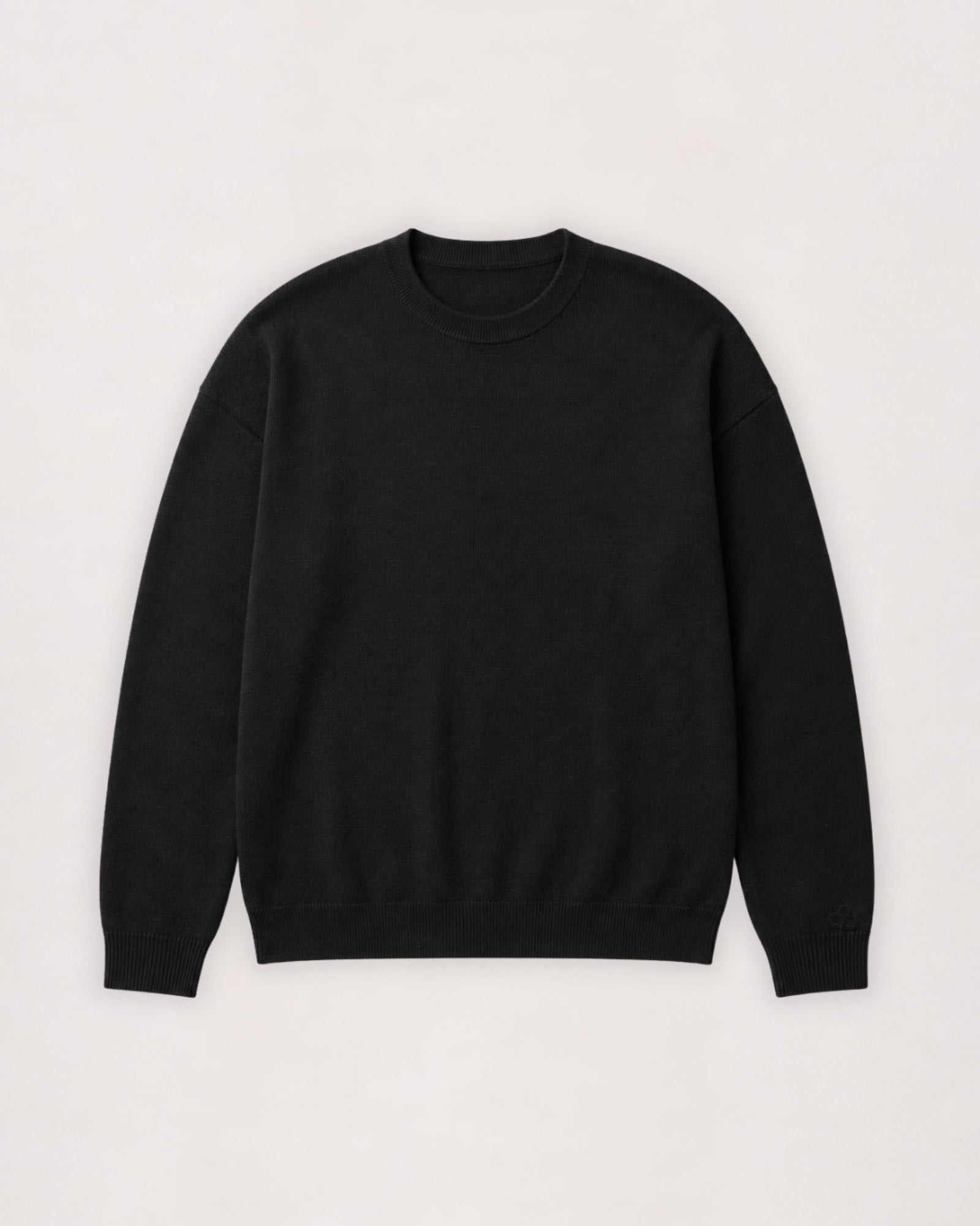 Merino crew neck sweater in black, flat lay front view
