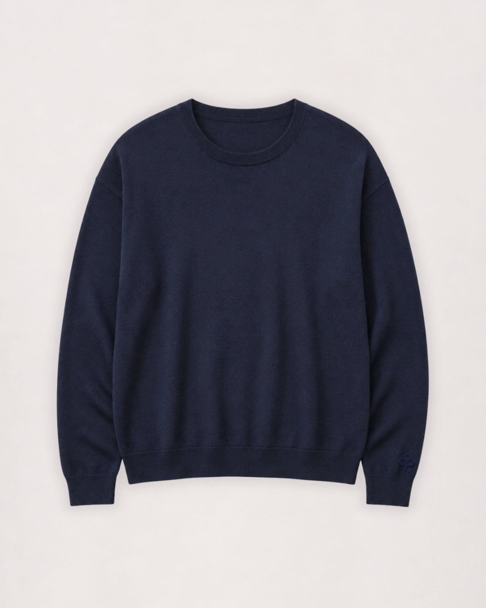 Merino crew neck sweater in navy, flat lay front view