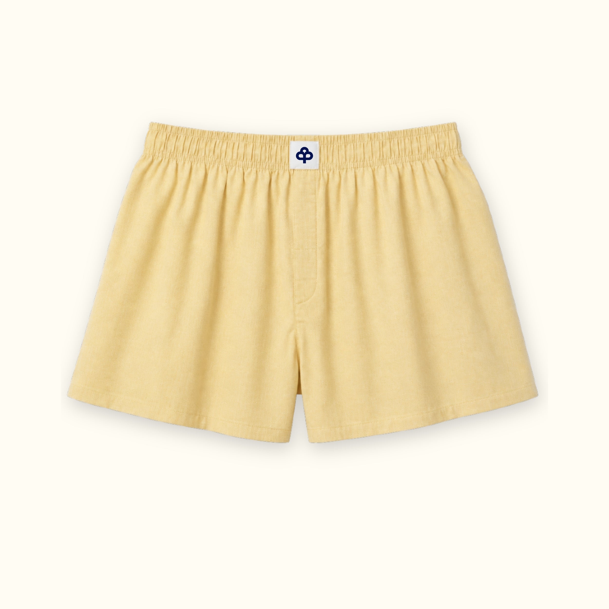Short tipo bóxer de algodón en Oxford amarillo claro, vista frontal, mostrando la cintura y la forma de la pernera
