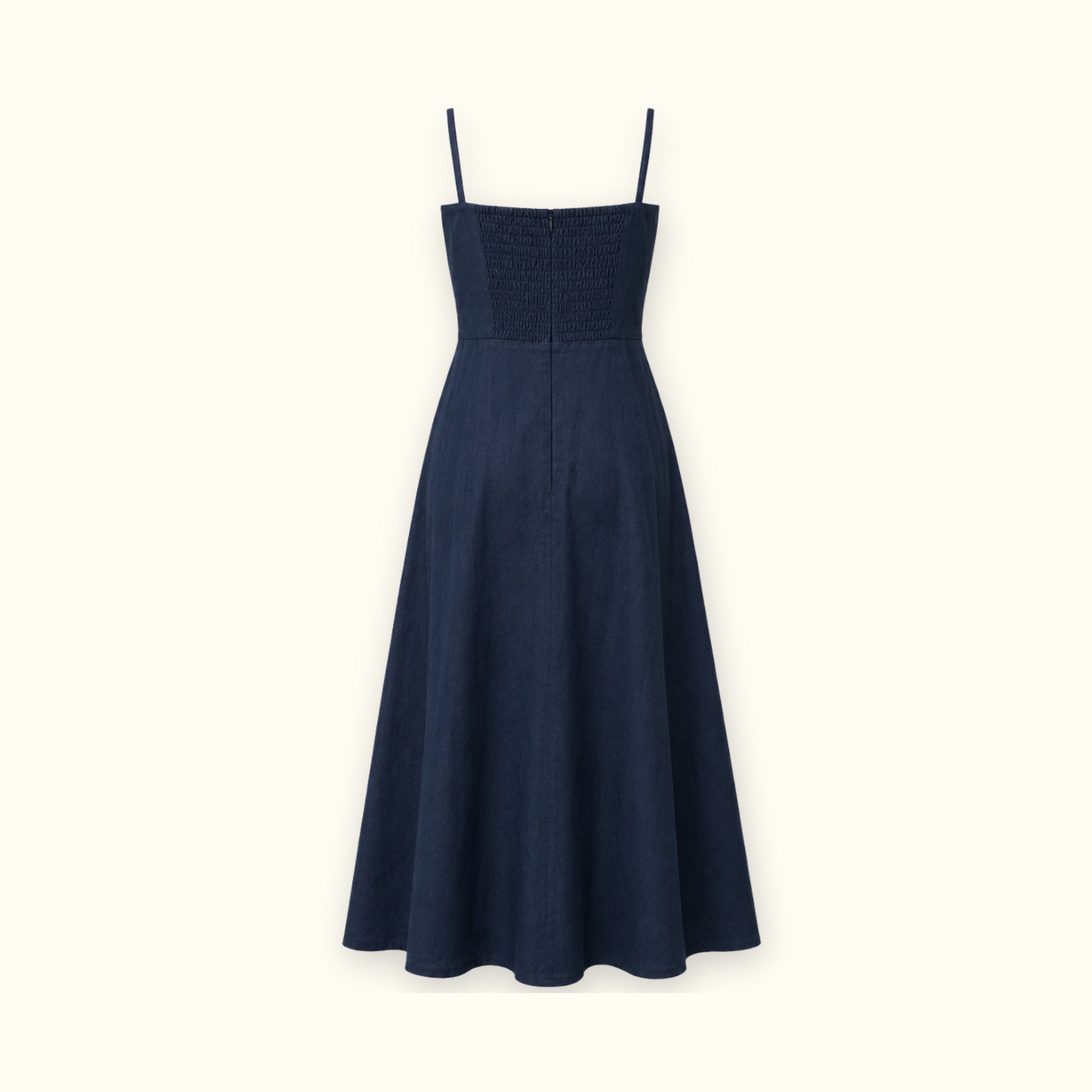 Vestido midi de lino en azul marino, vista trasera, mostrando el escote y la silueta del vestido